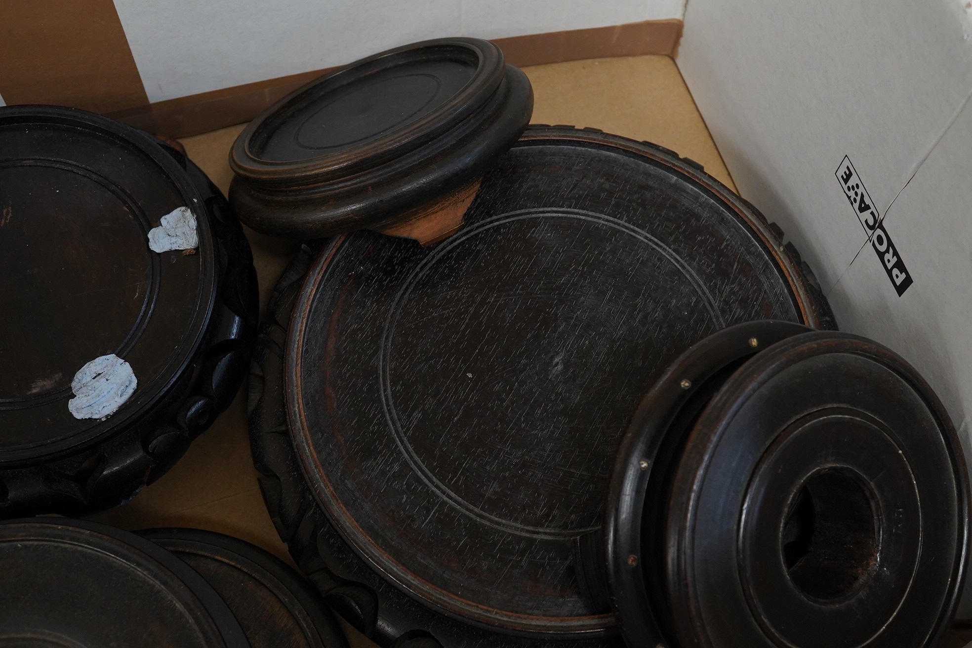 A group of Chinese hardwood stands largest 21cm in diameter. Condition - fair, some chips